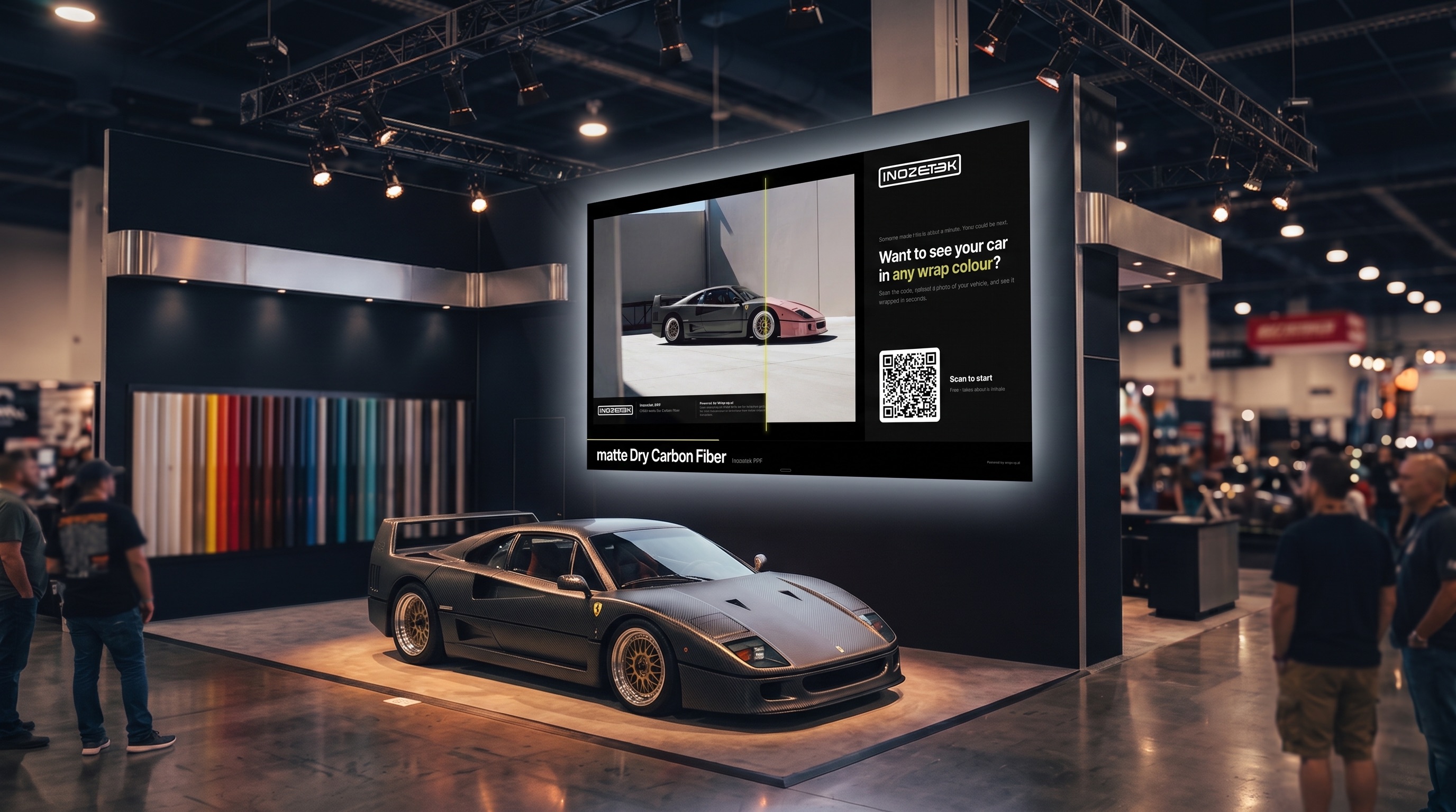 A vinyl brand's trade show stand with the WrapUp showroom playing on a large screen behind a wrapped car.